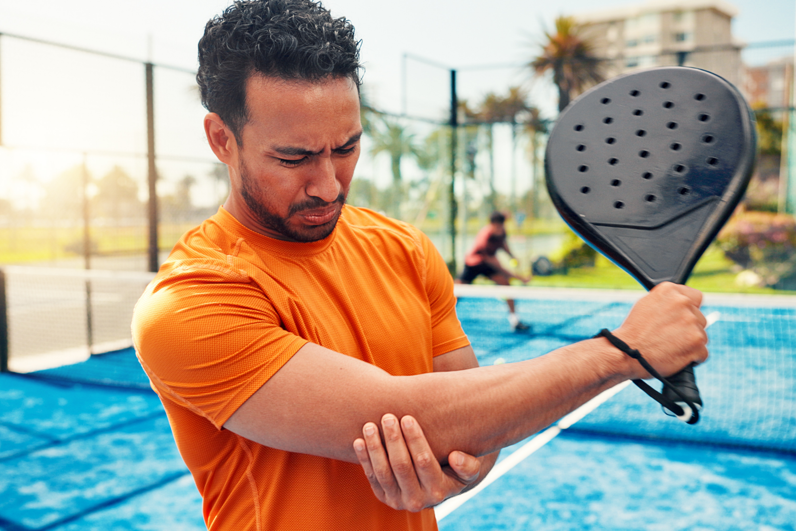 man with arm injury while playing sports
